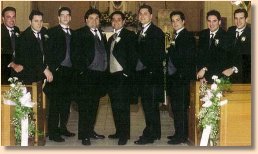 Men in wedding party wearing tuxes from DavidsFormalWear.com